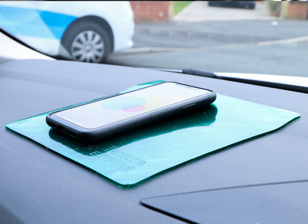 car-accessibility-tenura-extreme-mat-used-as-a-phone-holder-in-a-car