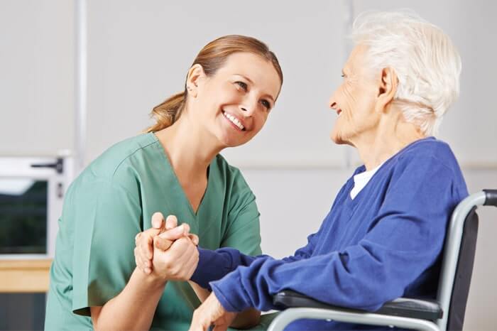 Occupational Therapist Treating Older Patient who needs help with their Activities of Daily Living