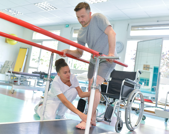 World Occupational Therapy Day-Occupational Therapist Treating Patient Who Requires Walking Aids