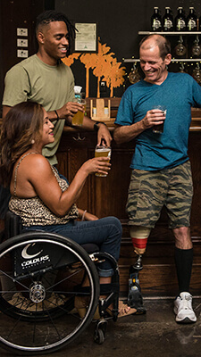 disabled-people-at-a-bar-with-friends-2 Disabled People at a Bar With Friends Having Fun