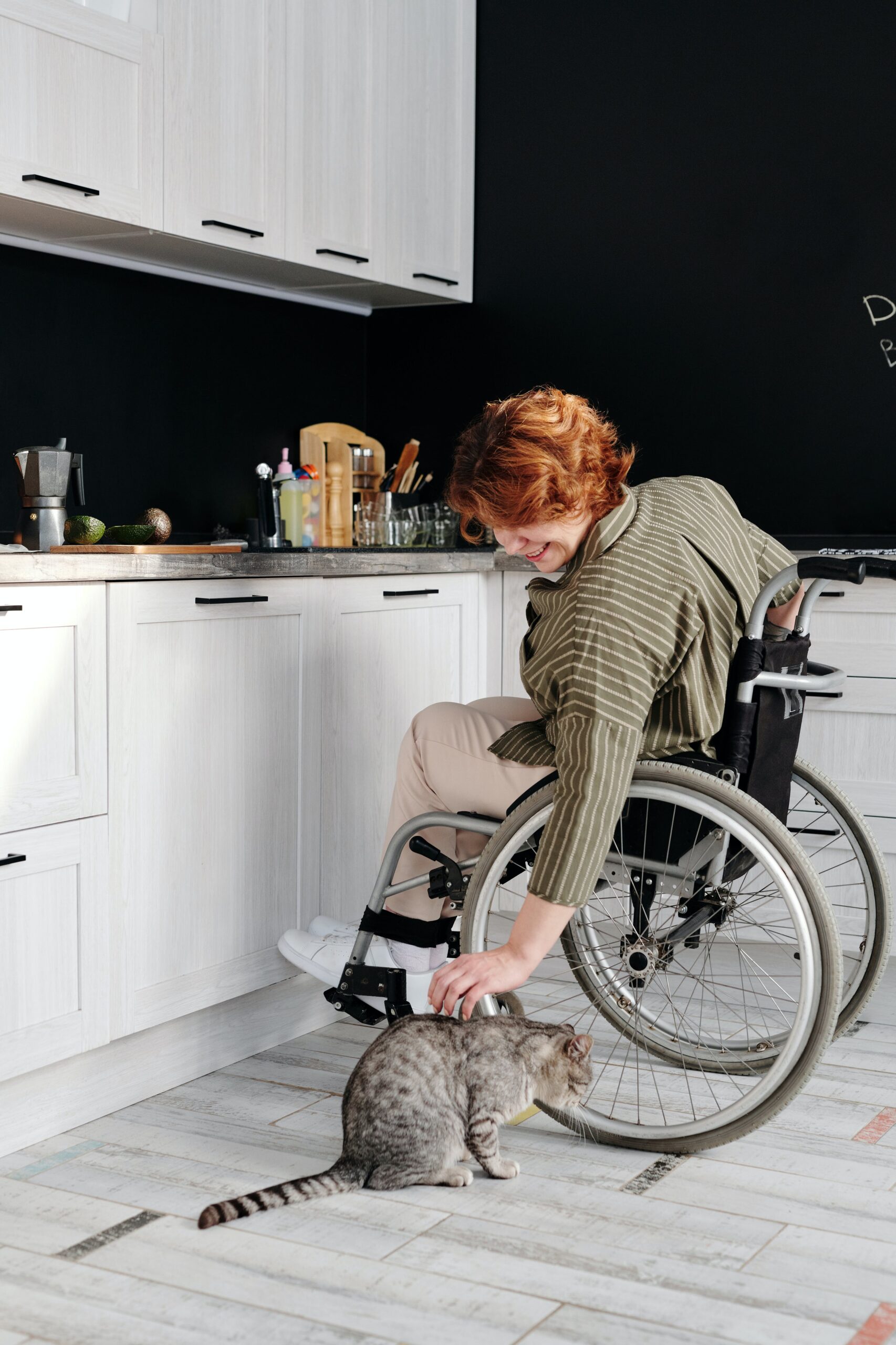 november-blog-1 Women in Wheelchair with Pet