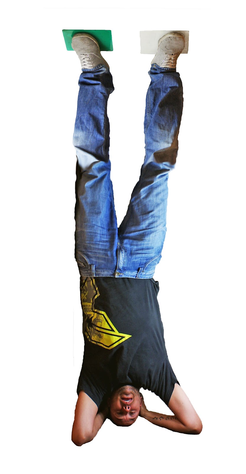 tenura_xtreme_upside_down Man Standing on Tenura Extreme Mat Upside Down
